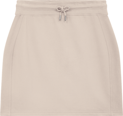 Stylish women’s organic cotton sweat skirt worn in a chic casual outfit, emphasising its versatility and timeless appeal in contemporary fashion.