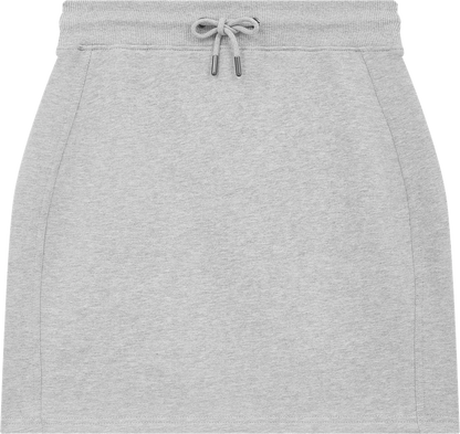 Elegant organic cotton sweat skirt in a natural setting, exemplifying eco-friendly luxury and effortless style for modern women.