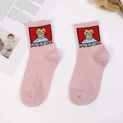 Stylish Hip Hop Long Socks for Women & Girls in soft pink, featuring a charming 'SAD BUT COOL' cat design, crafted from a luxurious cotton and polyester blend. A unique addition to your sock collection.