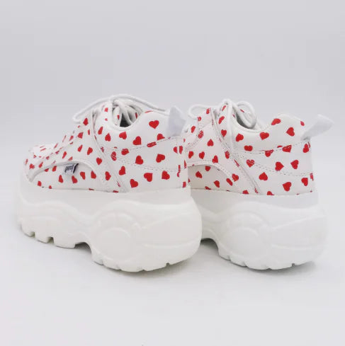 Stylishly crafted white sneaker with heart motifs, designed for chic casual wear.