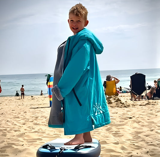 Chic FatStick changing robe with matching beanie hat, showcasing high-quality craftsmanship in child-friendly unisex style.