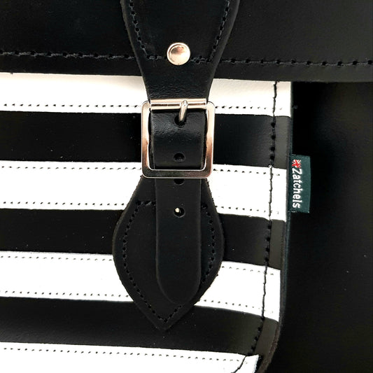 Close-up of Gothic Striped Leather Satchel's intricate cable stitching and premium quality leather, highlighting the luxurious details and durable silver nickel buckles.