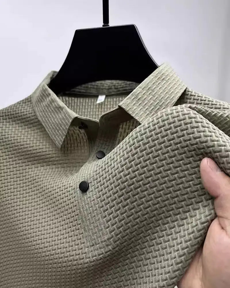 Chic olive green short-sleeved Men's Polo Shirt with a textured surface and elegant lapel design, perfect for versatile styling.