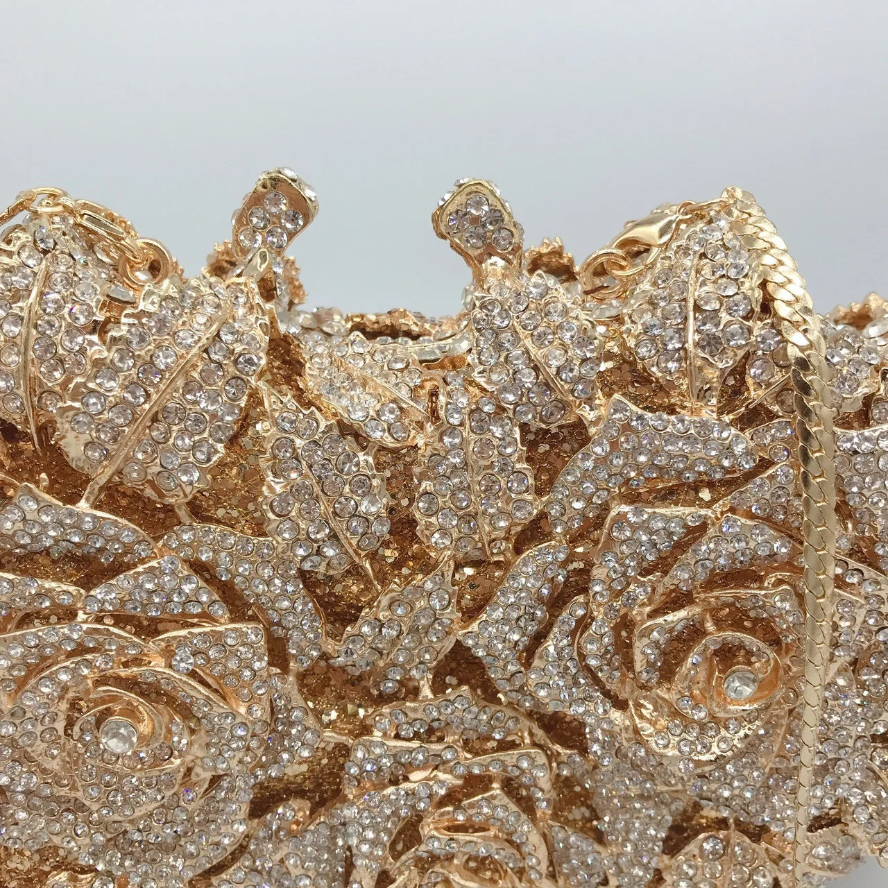 Chic and glamorous evening clutch purse made from premium metallic leather, suitable for complementing elegant outfits.