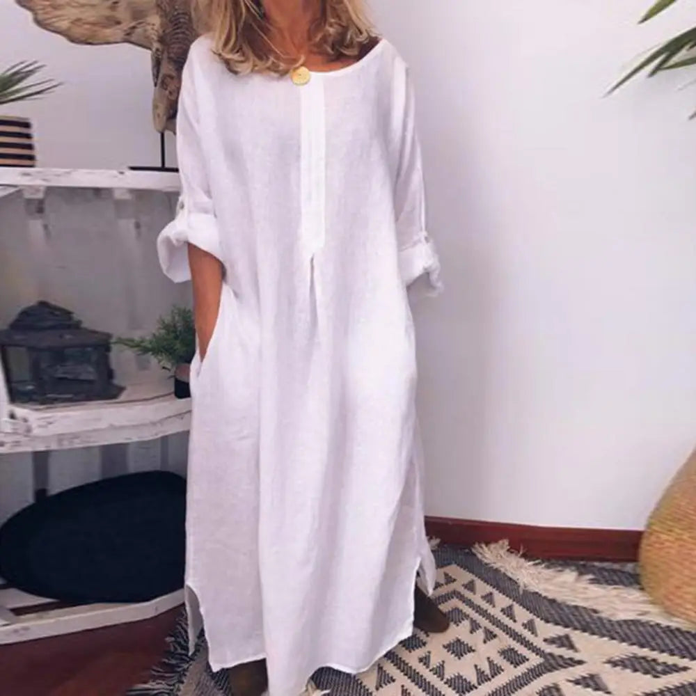 Stunning women's oversized maxi dress in solid hue, exemplifying luxury summer fashion. Crafted from soft cotton for a relaxed yet sophisticated look.