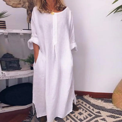 Stunning women's oversized maxi dress in solid hue, exemplifying luxury summer fashion. Crafted from soft cotton for a relaxed yet sophisticated look.