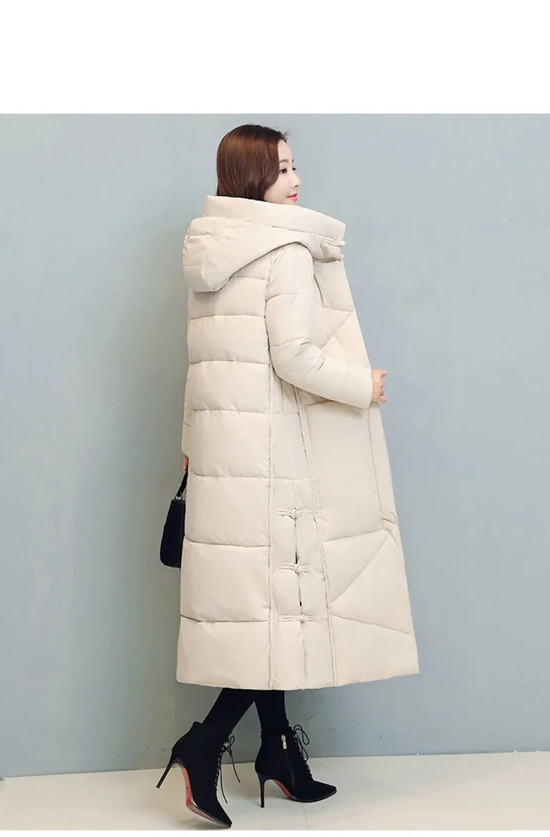 Chic padded hooded jacket for women, crafted from premium cotton and polyester, ideal for commanding attention during winter outings.