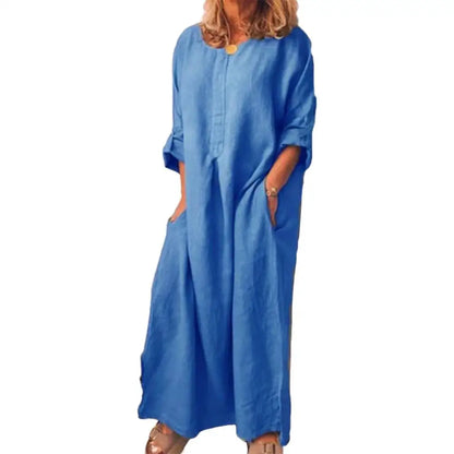 Chic Women's Oversized Cotton Long Shirt Dress, perfect for a relaxed summer look, highlighting half sleeves and a graceful A-line profile.