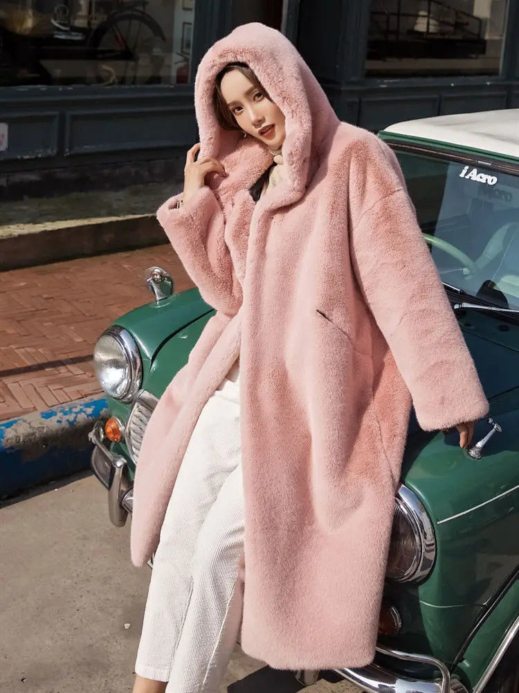 Stylish Women's Thick Warm Faux Fur Overcoat featuring a hood and pockets, ideal for winter sophistication.