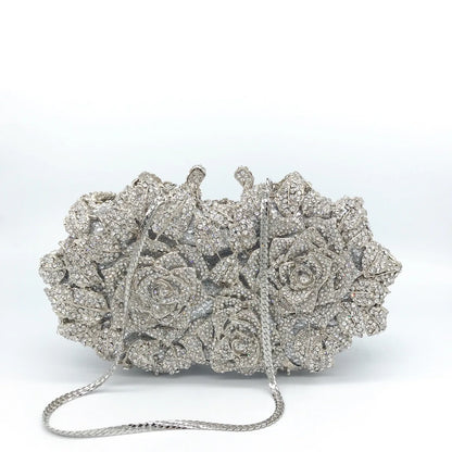Luxurious women's metallic leather minaudière clutch evening purse embellished with sparkling crystals, perfect for elegant occasions.