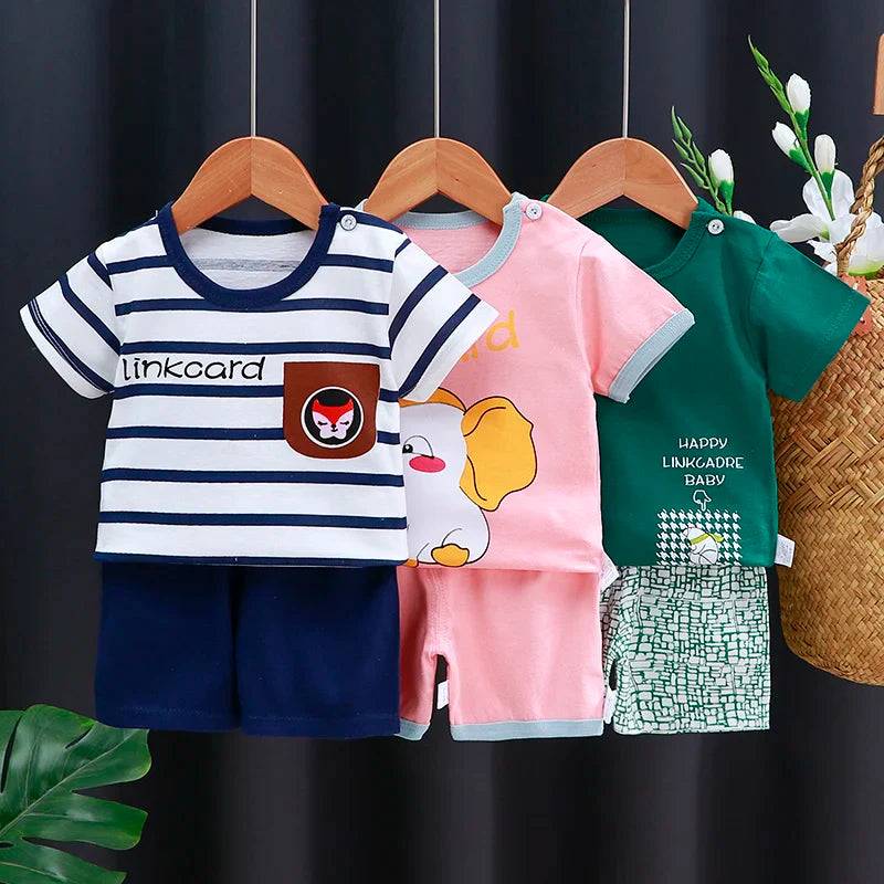 Luxury unisex kids summer clothing set featuring a soft cotton T-shirt and stylish shorts for baby boys and girls aged 1-3 years.