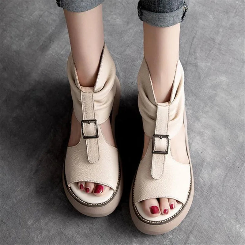 Elegant women's gladiator sandals in luxurious leather, offering a chic platform height of 3-5cm for sophisticated casual wear.