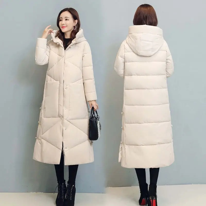 Chic display of a women's windproof long coat, showcasing its fashionable silhouette and luxurious fabric ideal for cold weather.