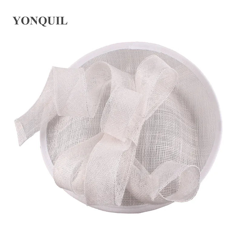 Sophisticated Sinamay Church Hat in soft pastels, an elegant choice for brides and guests at spring weddings and garden parties.