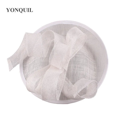 Sophisticated Sinamay Church Hat in soft pastels, an elegant choice for brides and guests at spring weddings and garden parties.