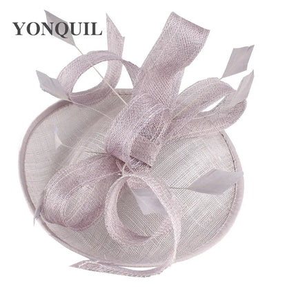 Graceful sinamay fascinator hat in light beige, designed for women attending weddings and luxurious parties.