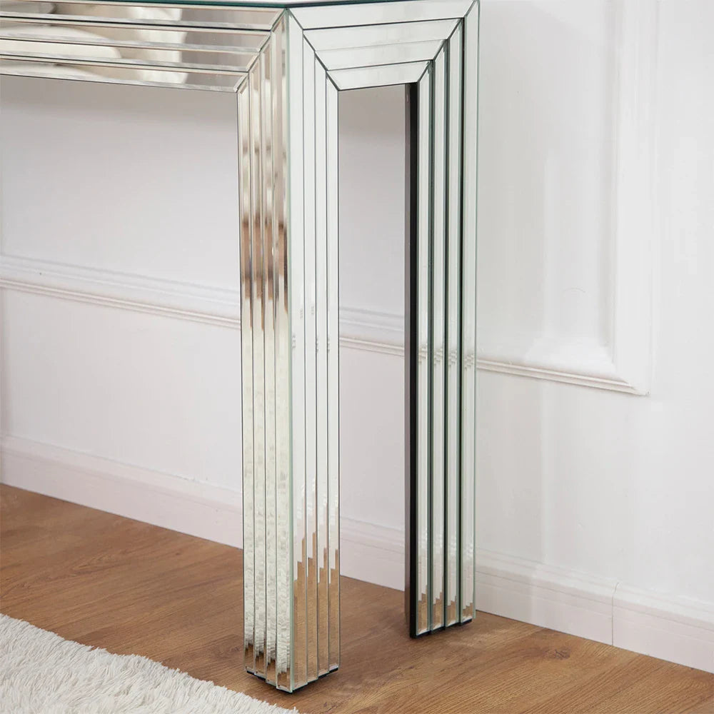 Luxury modern mirrored console table featuring a sleek glass top, perfect for enhancing living room and entryway aesthetics.