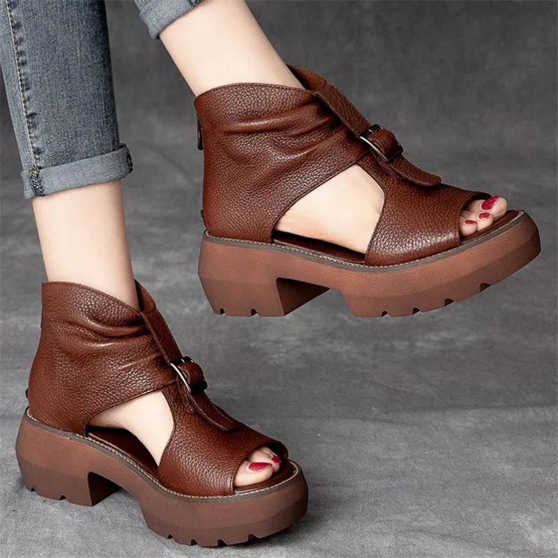 Stylish mid-heel open toe gladiator sandals crafted from fine leather, showcasing a refined vintage aesthetic, suitable for fashion-forward women.