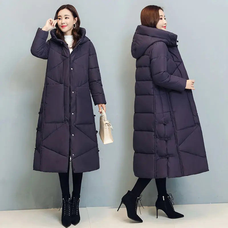 Model wearing an exquisite women's thick cotton hooded jacket, embodying fashion and functionality during winter.