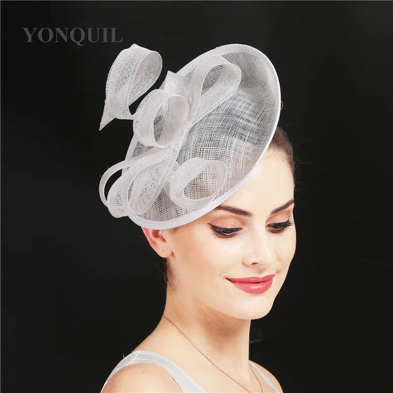 Beautiful women’s fascinator with intricate fabric folds, suitable for chic weddings and sophisticated parties.