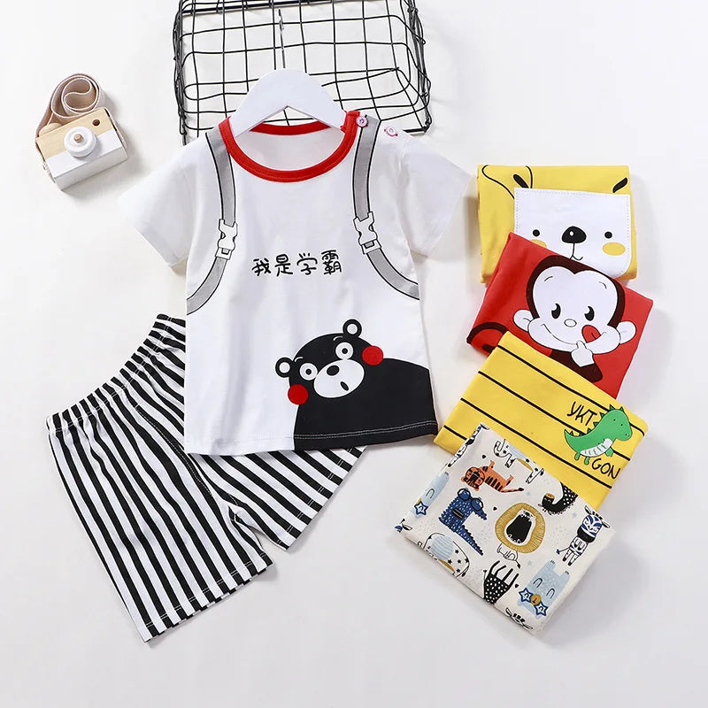 Fashionable unisex summer clothing set for toddlers aged 1-3, featuring a finely crafted cotton T-shirt and shorts for ultimate comfort and style.
