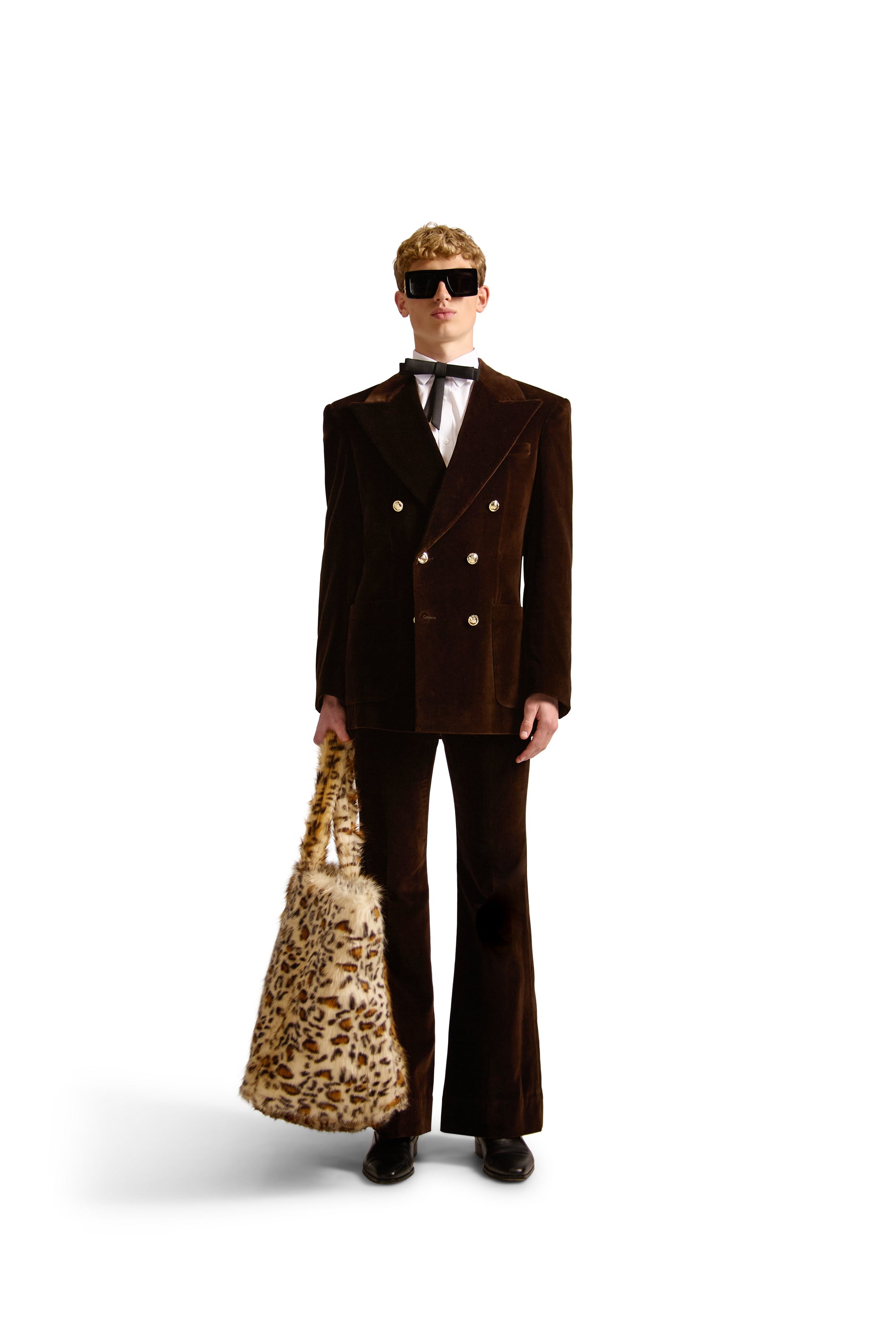 Chic interior view of oversized faux fur shoulder bag showcasing zipper compartments and button close pouch, crafted in Italy.