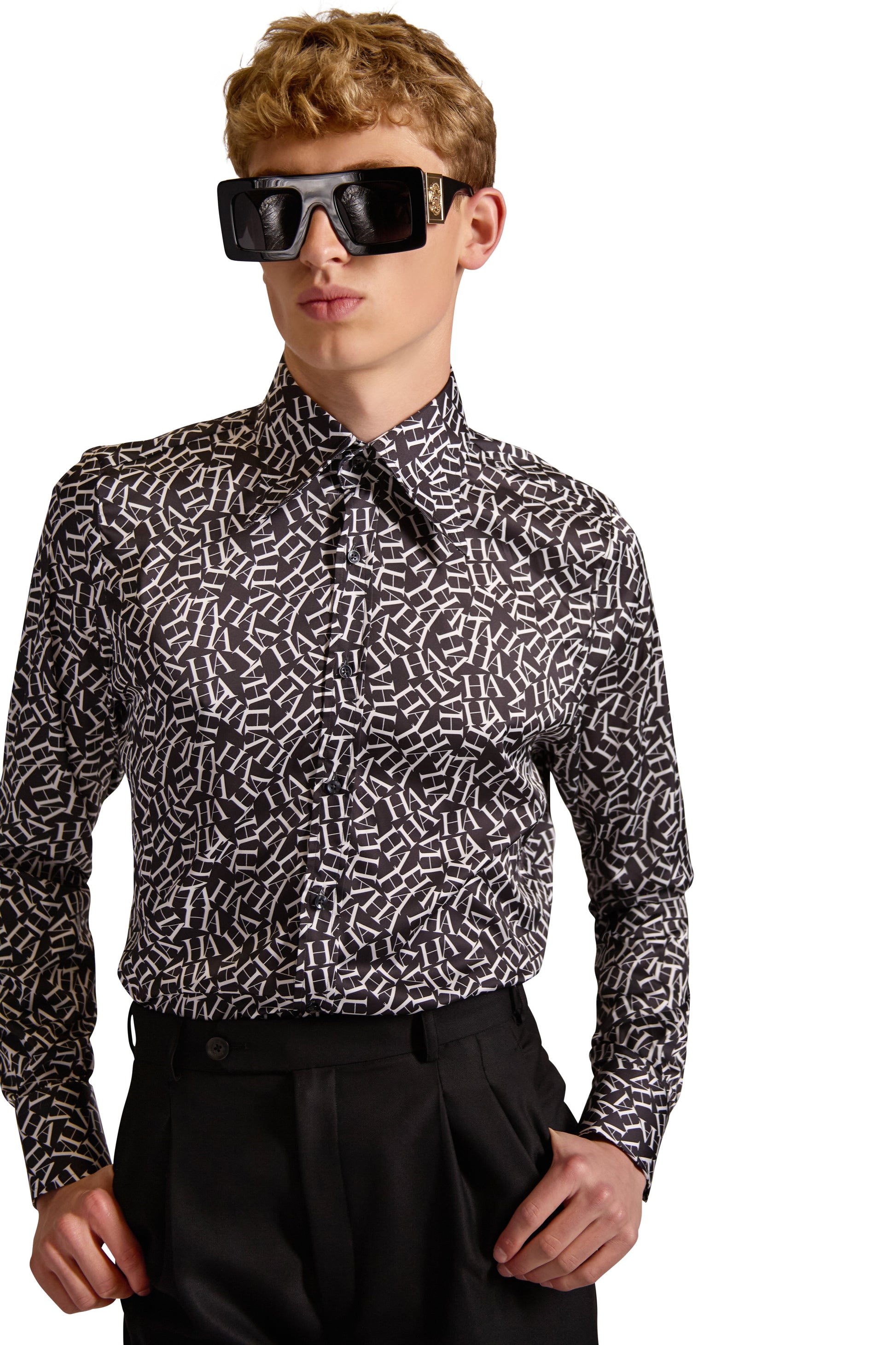 Sophisticated long sleeve tailored shirt made in Italy, showcasing an exclusive monogram design and curved hemline for a refined look.