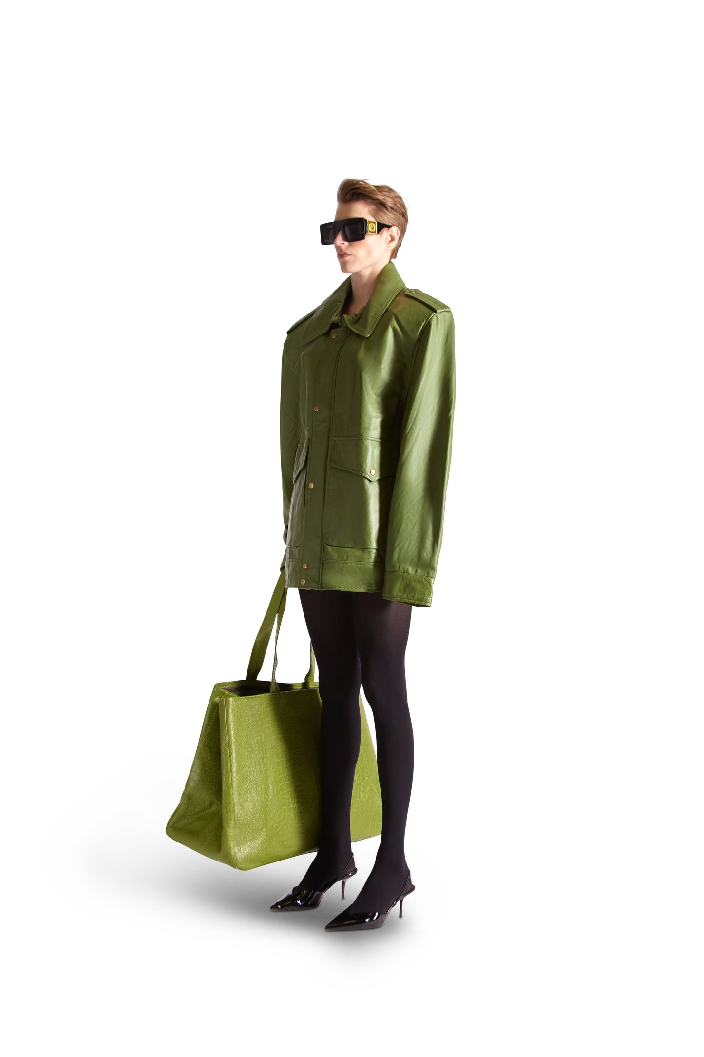 Oversized Italian leather tote shoulder bag in luxe style with inside zips, button-close pouch, and slip pockets, dimensions 22" x 16" x 10.5" by Helen Anthony.