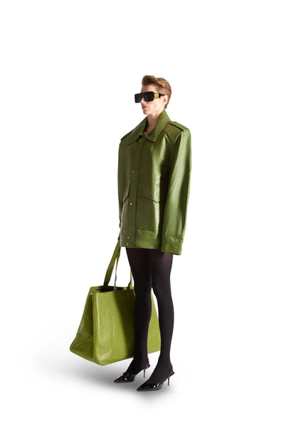 Oversized Italian leather tote shoulder bag in luxe style with inside zips, button-close pouch, and slip pockets, dimensions 22" x 16" x 10.5" by Helen Anthony.