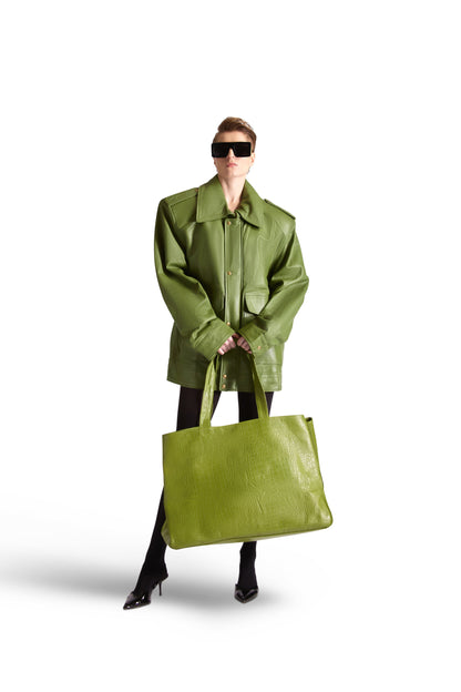 Luxury oversized Italian leather tote shoulder bag in elegant design, featuring spacious dimensions of 22" x 16" x 10.5", inside zips, and a stylish button close pouch, perfect for sophisticated outings.