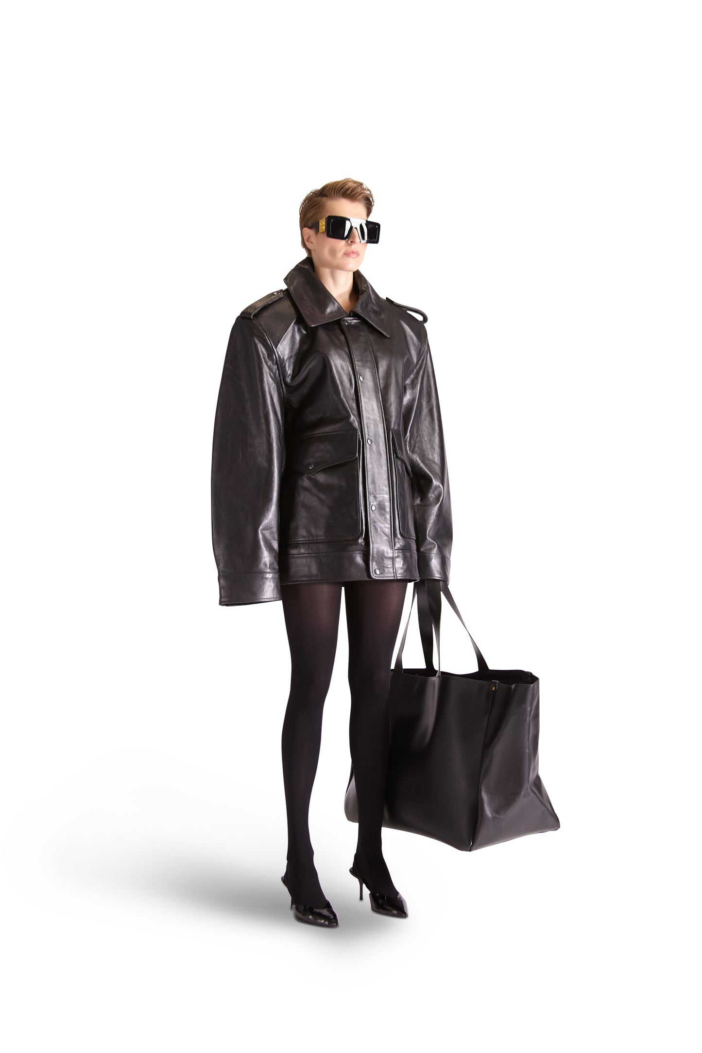 Interior view of the Helen Anthony leather tote bag revealing multiple inside zips and slip pockets for organized storage.