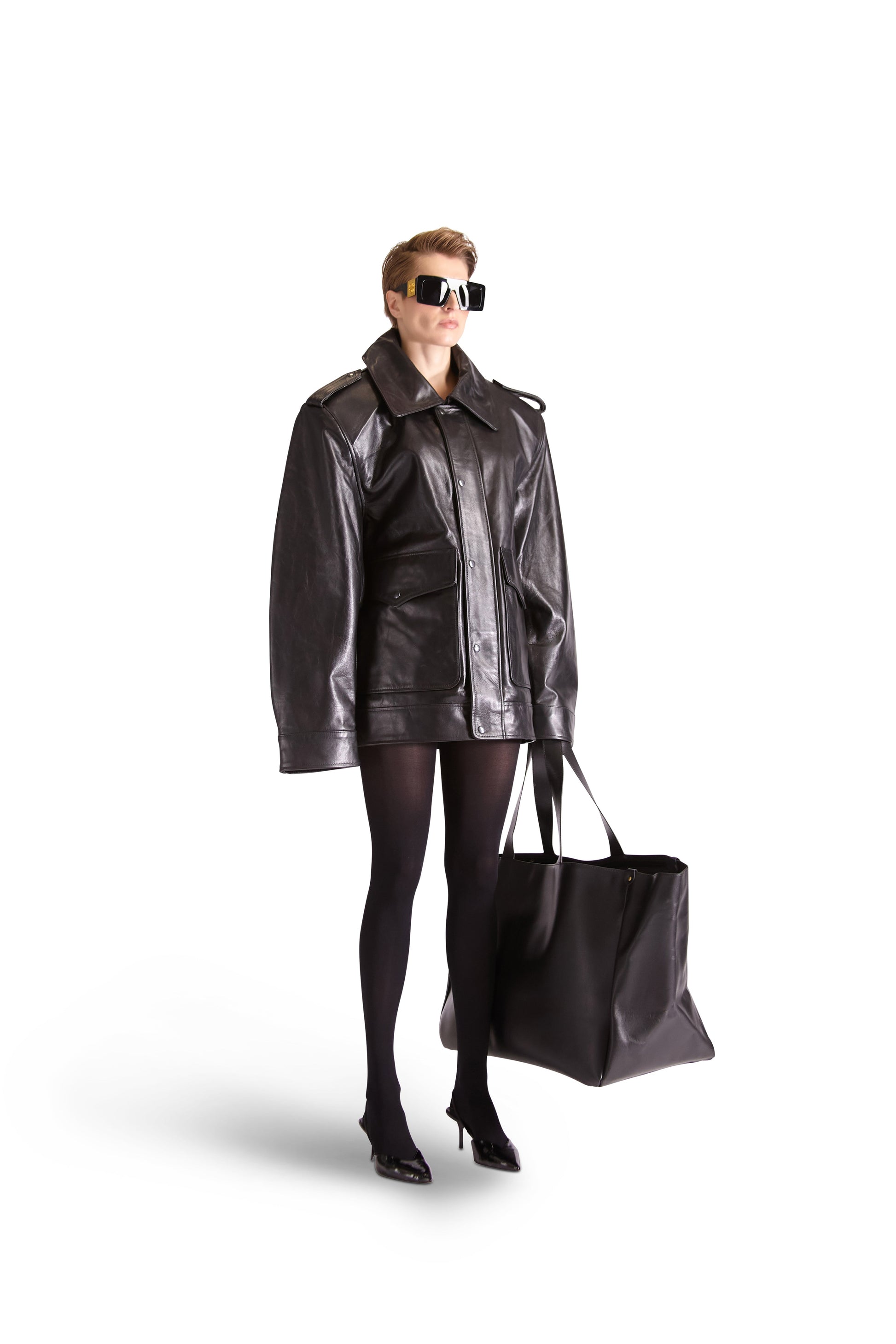 Interior view of the Helen Anthony leather tote bag revealing multiple inside zips and slip pockets for organized storage.