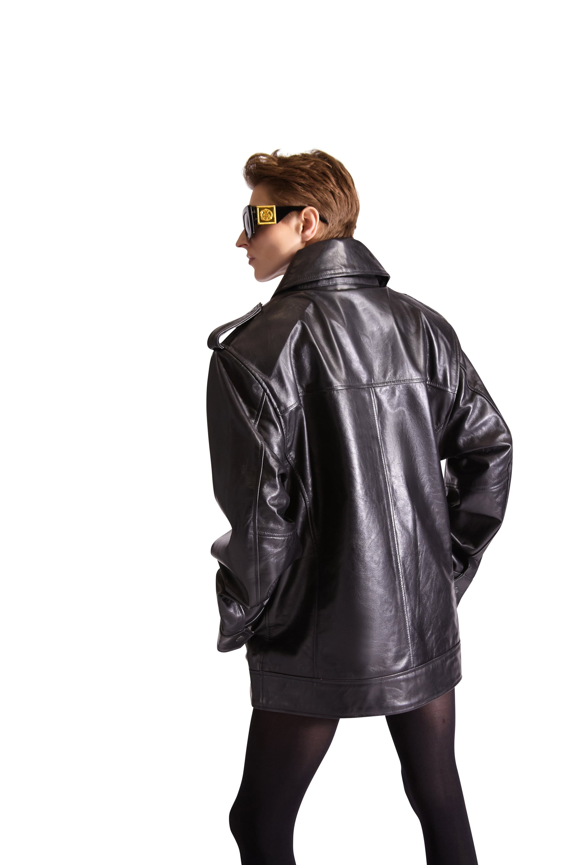 Detail view of Helen Anthony oversized leather shoulder bag, highlighting the inside button closure pouch and slip pockets for added convenience.