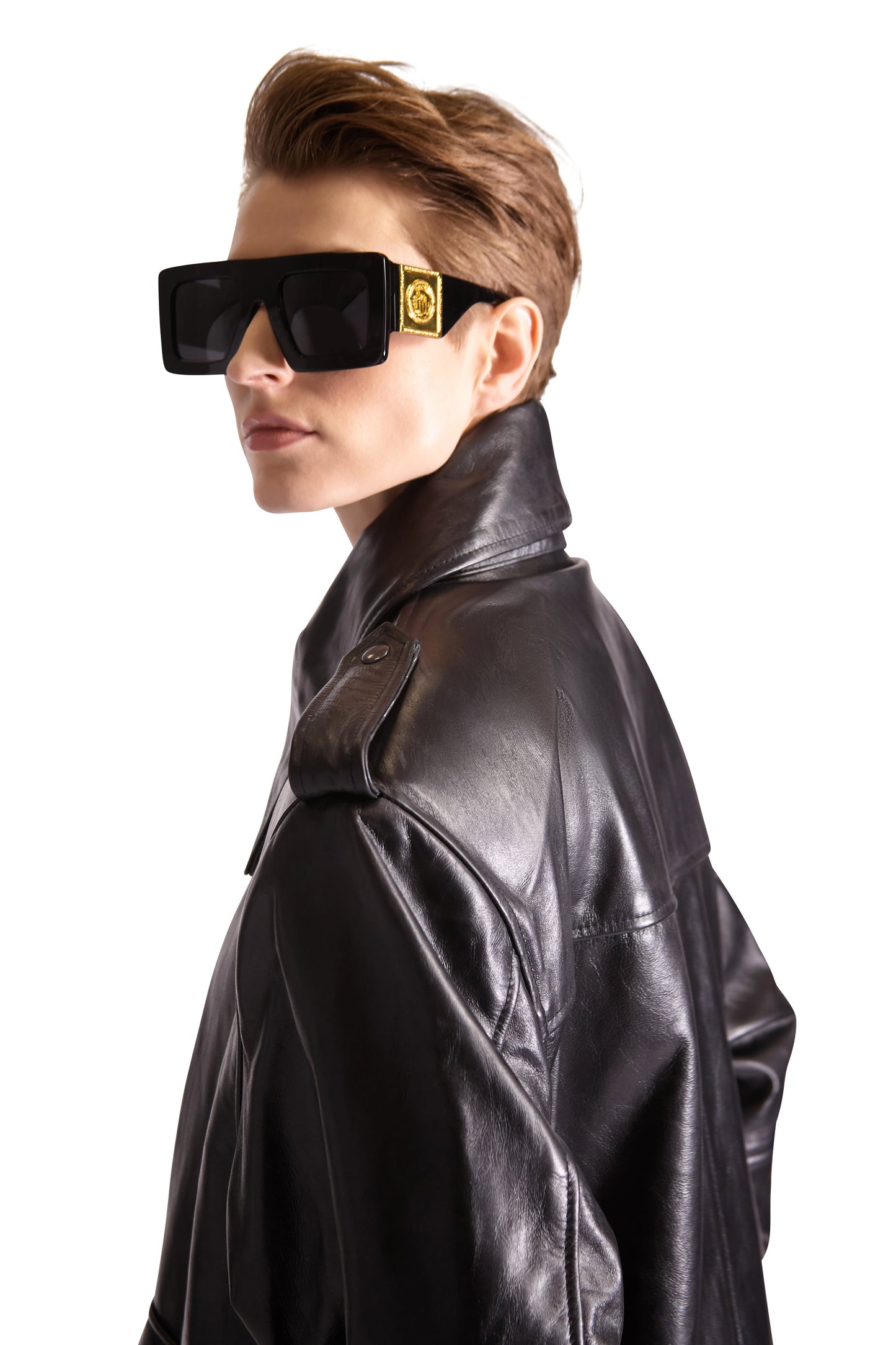 Chic oversized leather shoulder tote by Helen Anthony, featuring sophisticated hardware and spacious interior designed for modern luxury.