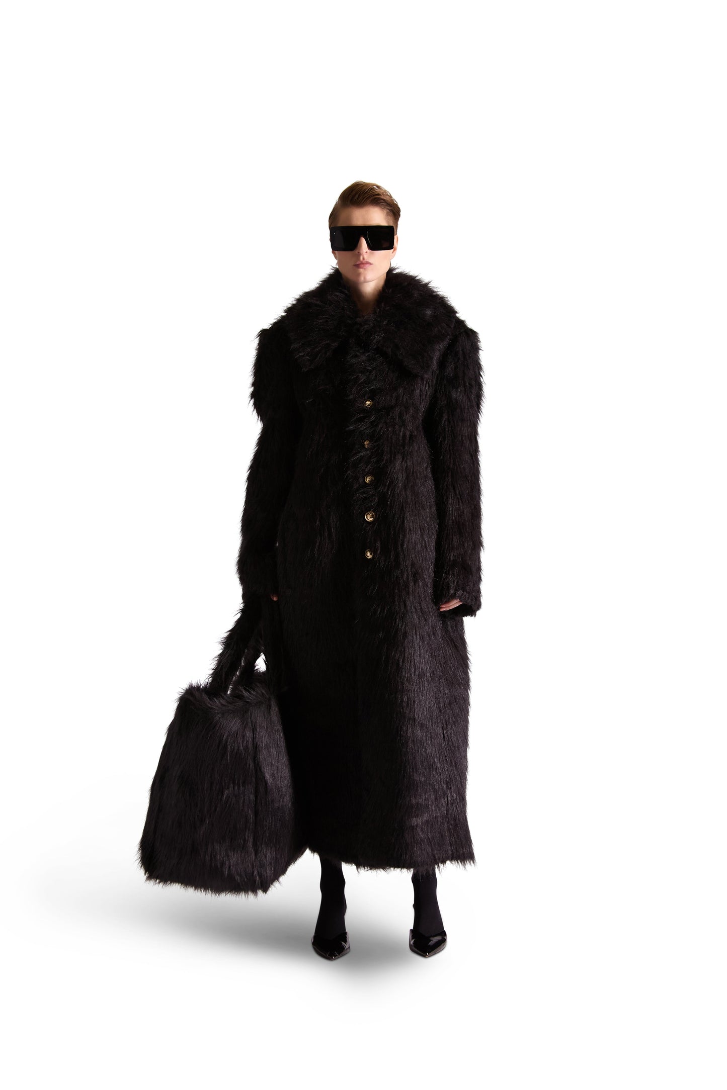 Stylish faux fur shoulder bag showcasing sophisticated oversized design, includes metal hook closure, made in Italy with ample pockets for practicality and chic appeal.