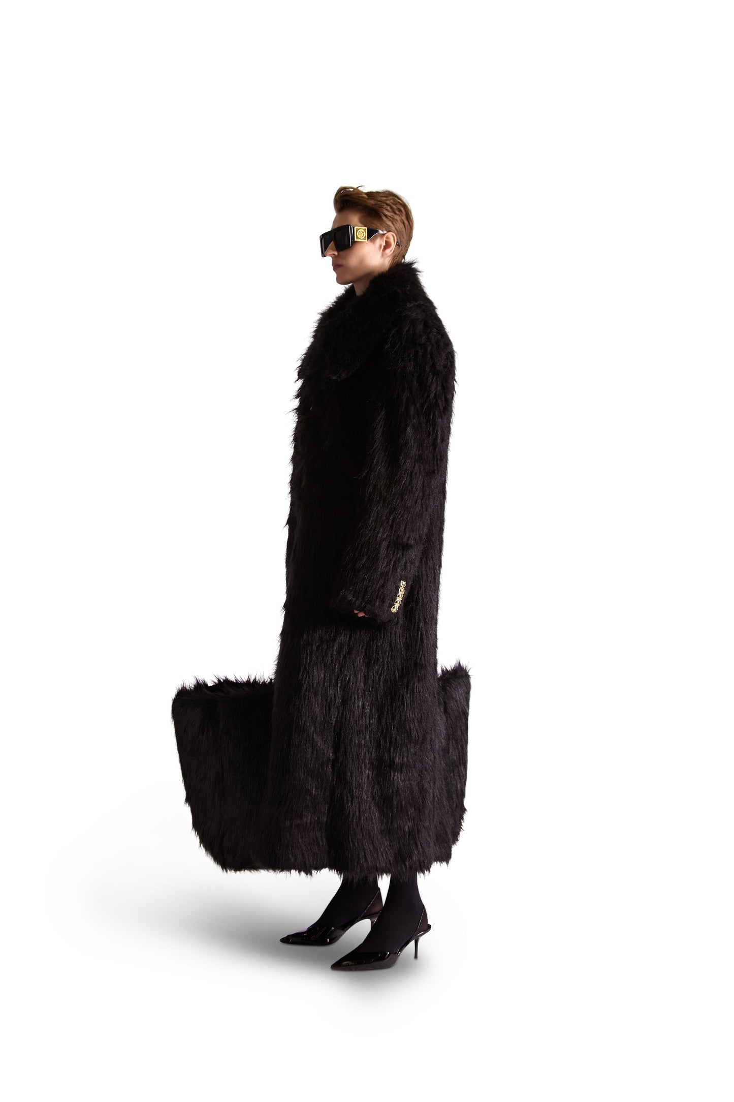 Interior view of the premium faux fur shoulder bag, highlighting multiple zip compartments and slip pockets for organised storage.