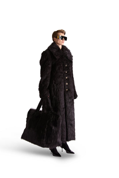 Luxury oversized faux fur shoulder bag with multiple pockets, crafted in Italy, showcasing a stylish design for elegant outings.