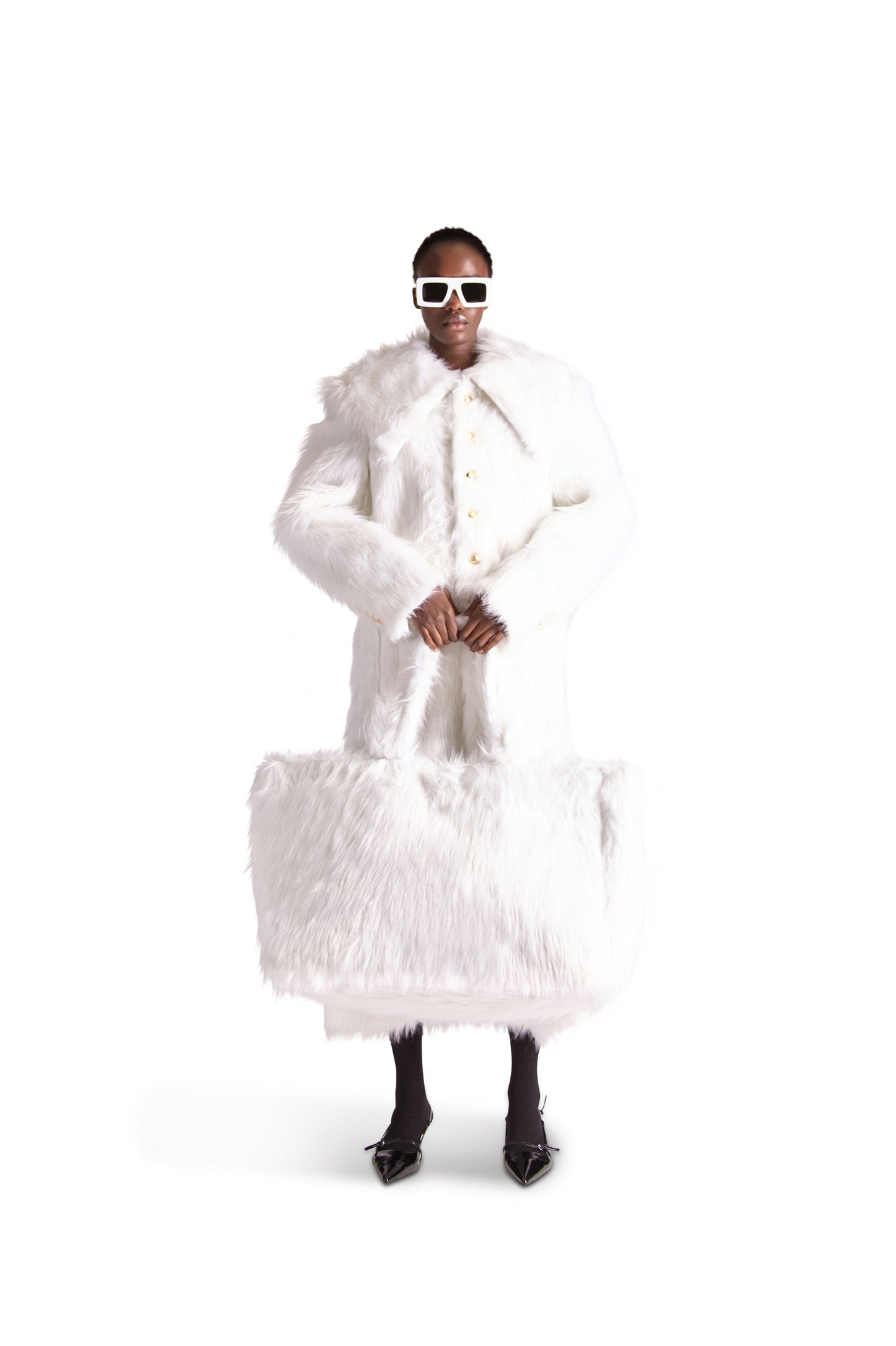 Elegant oversized faux fur shoulder bag in luxurious grey featuring multiple interior zips and slip pockets, perfect for stylish organisation.