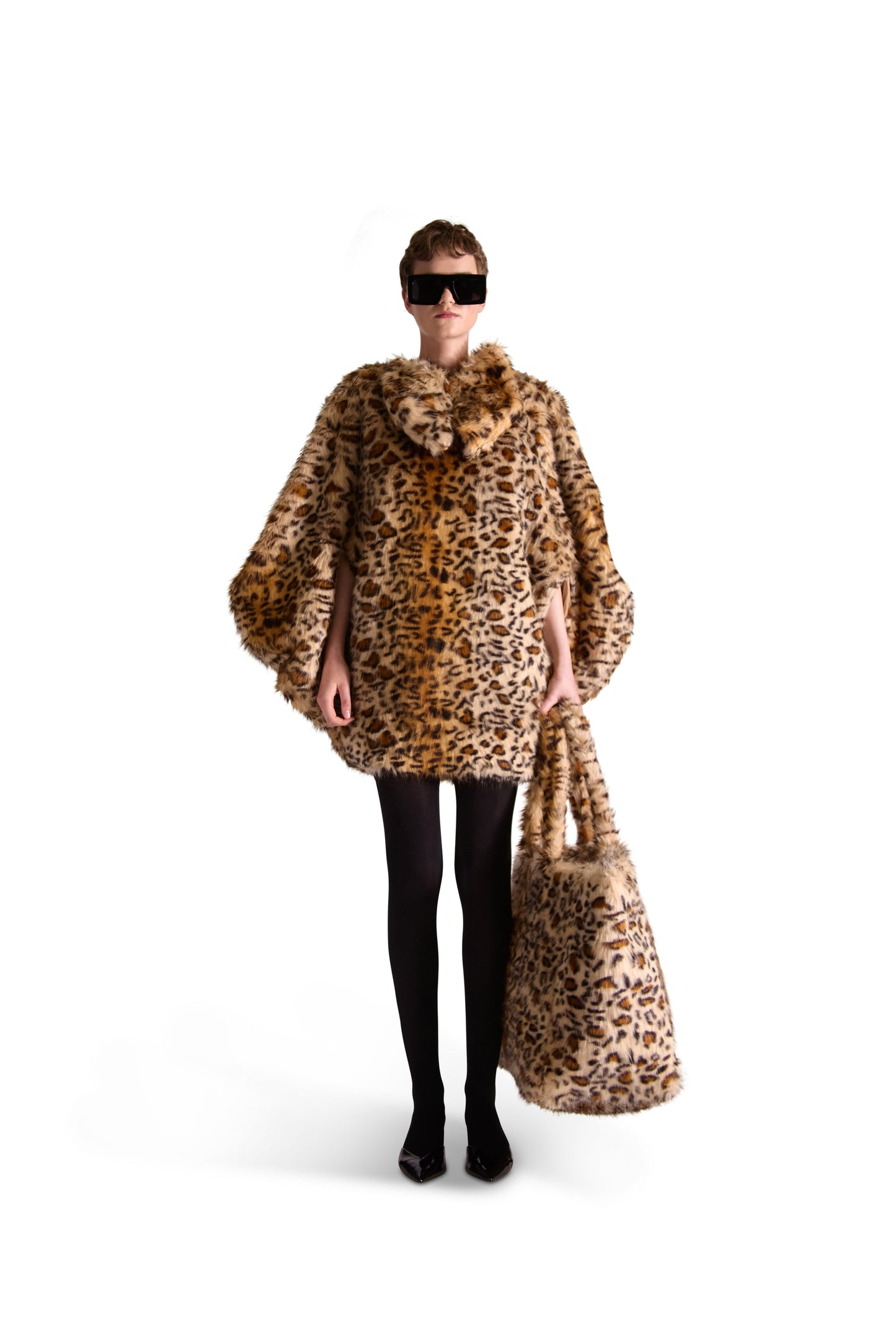 Elegant oversized animal print faux fur shoulder bag from Helen Anthony, showcasing intricate patterns and luxurious texture.