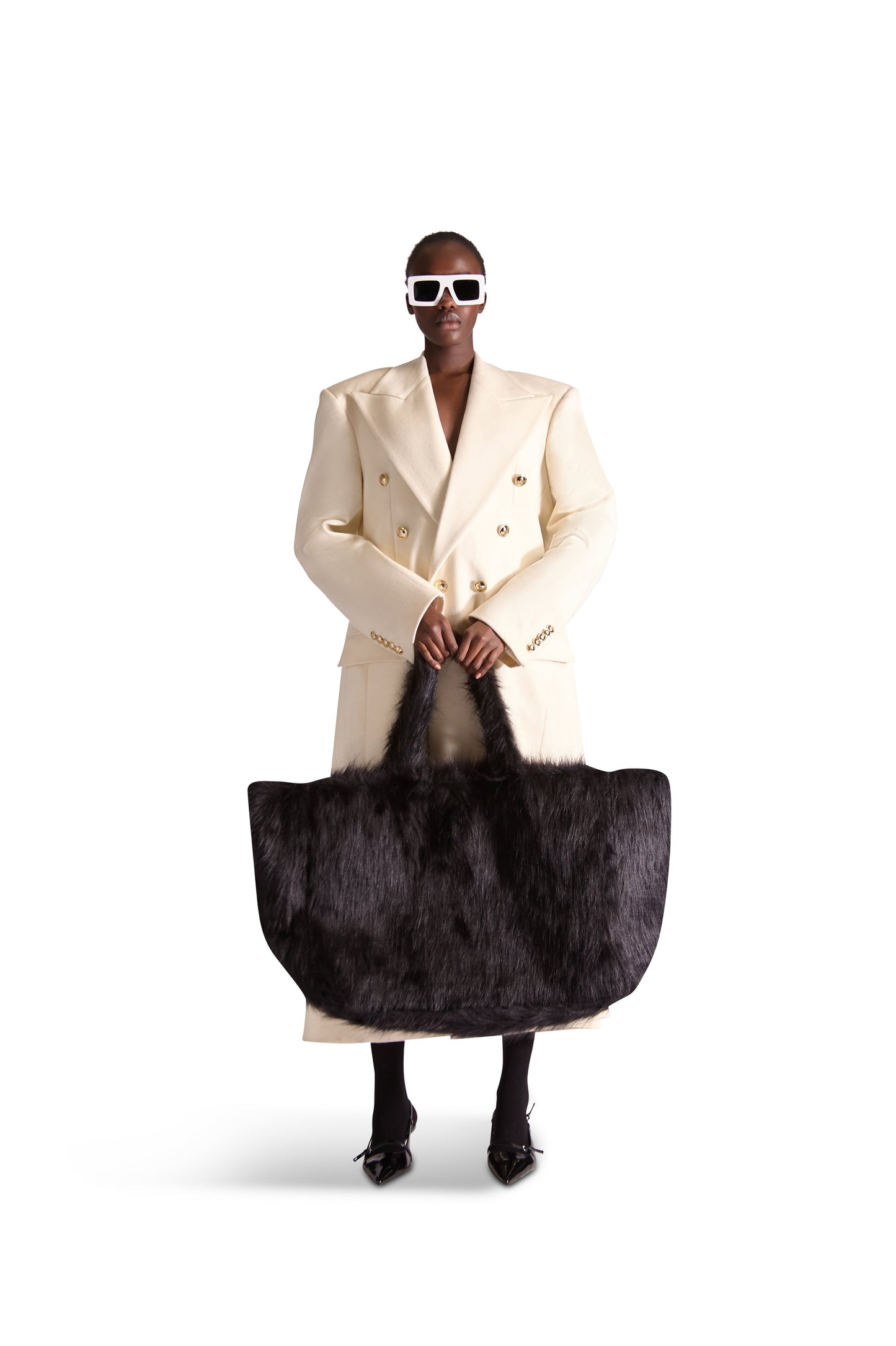 Elegant Helen Anthony oversized faux fur shoulder bag in luxurious cream, showcasing inside zip pockets and a chic design, measuring 24" x 16" x 10.5".