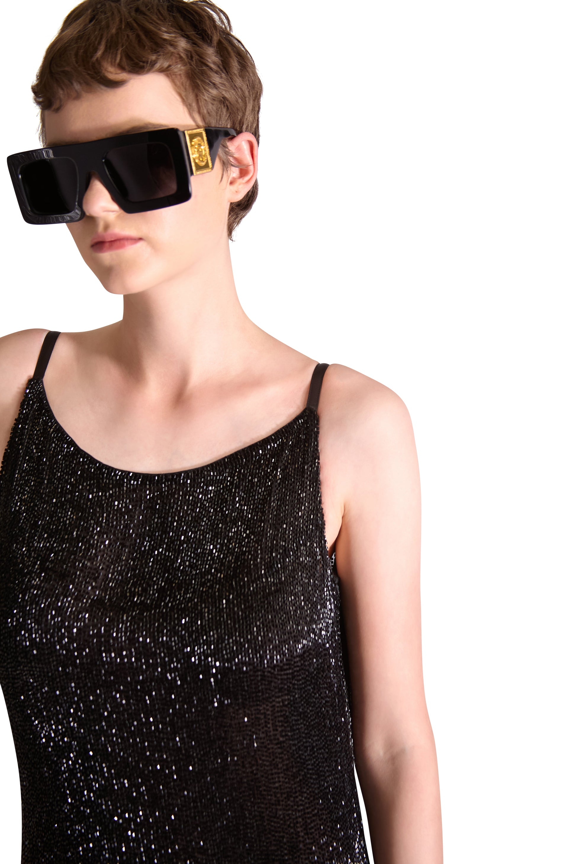 Full view of a floor-length luxury evening dress adorned with sparkling katdana beads, ideal for formal occasions.