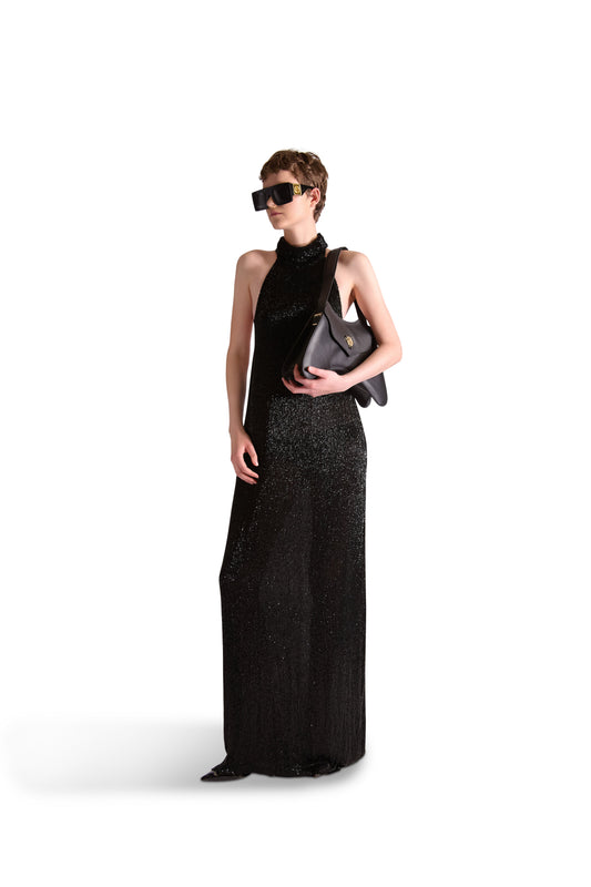 Detail view of a luxury evening dress demonstrating the intricate katdana beadwork and high neck collar, epitomising sophistication and style.