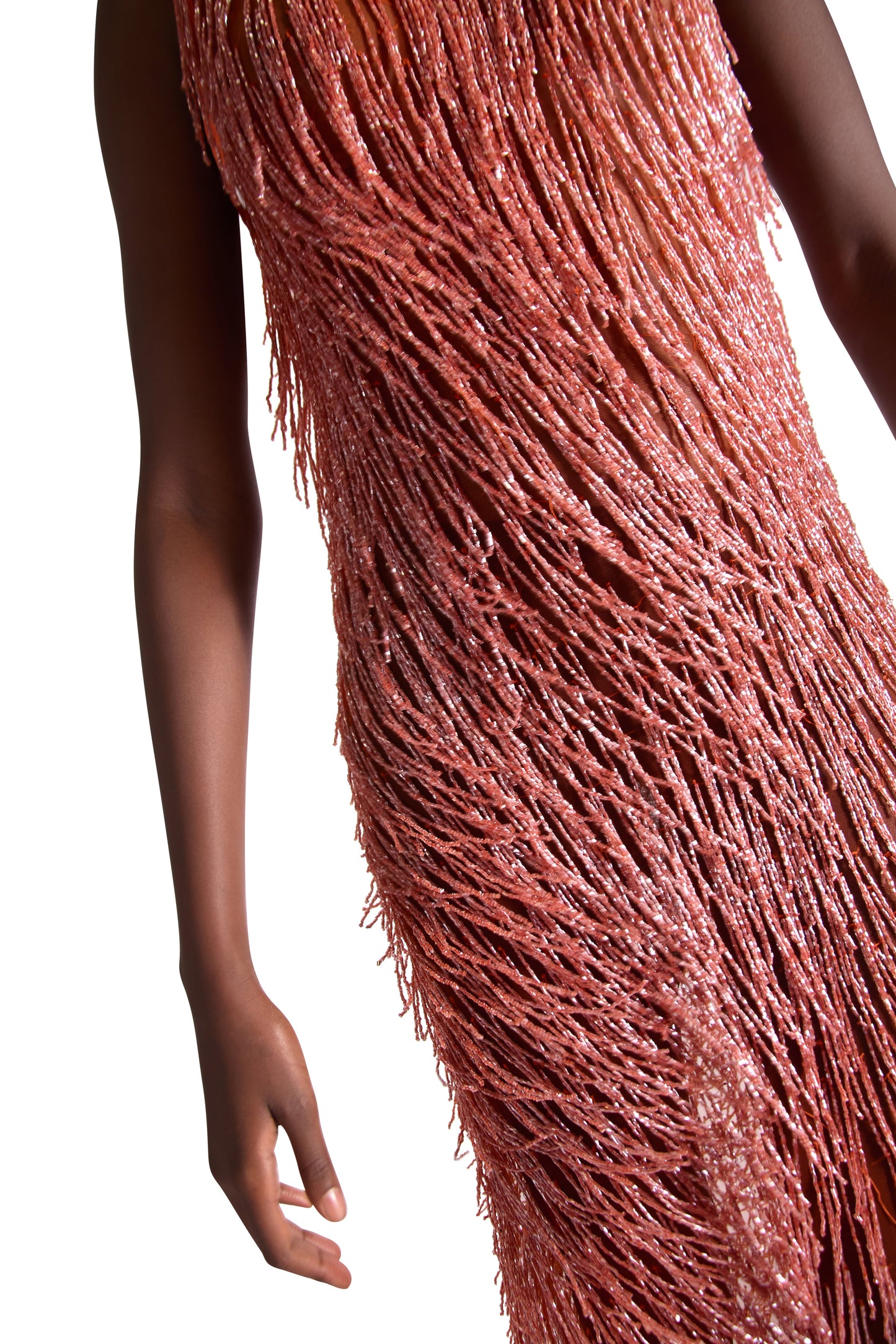 Full length shot of the stunning hand embroidered sleeveless evening gown with tassels, designed for glamorous evening events.