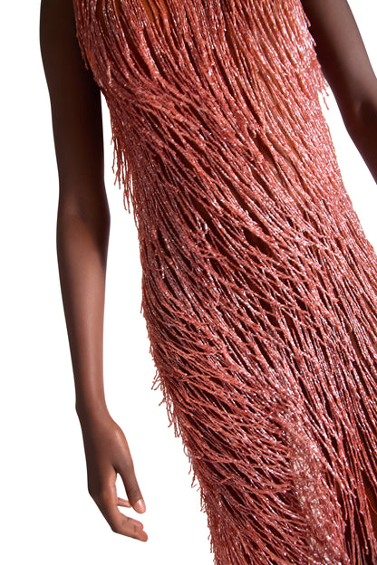 Full length shot of the stunning hand embroidered sleeveless evening gown with tassels, designed for glamorous evening events.