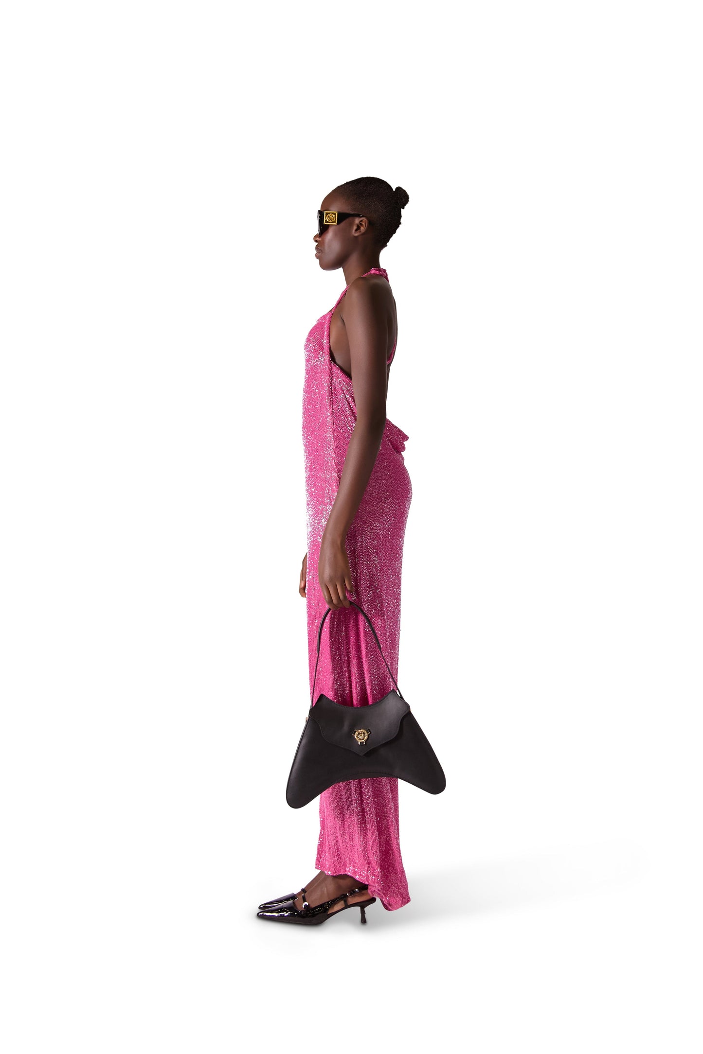 Elegant hand embroidered backless evening dress adorned with katdana beads, featuring a luxurious tie up neck design, perfect for formal occasions.