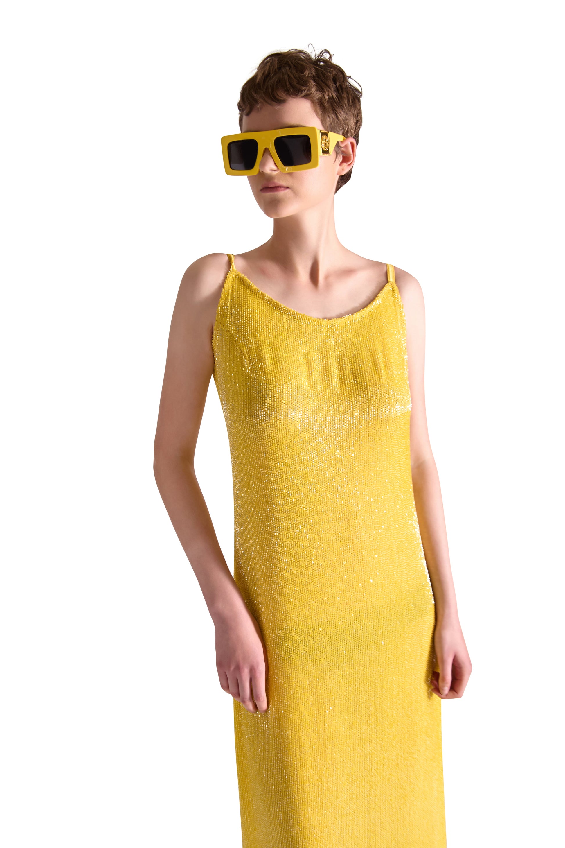 Elegant luxury hand embroidered Katdana beaded evening dress with spaghetti straps, featuring a rounded neckline and floor length design, made in Italy.