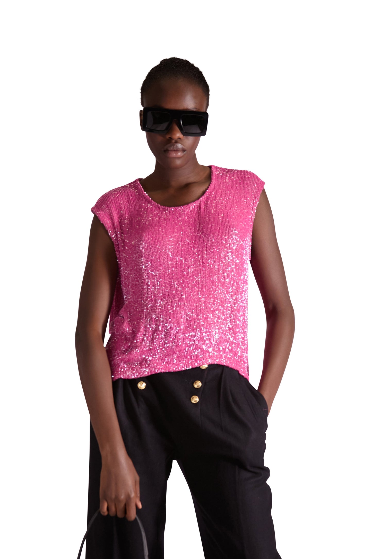 Back view of a premium silk top with zip closure, highlighting its elegant silhouette and silk lining for a luxurious finish.