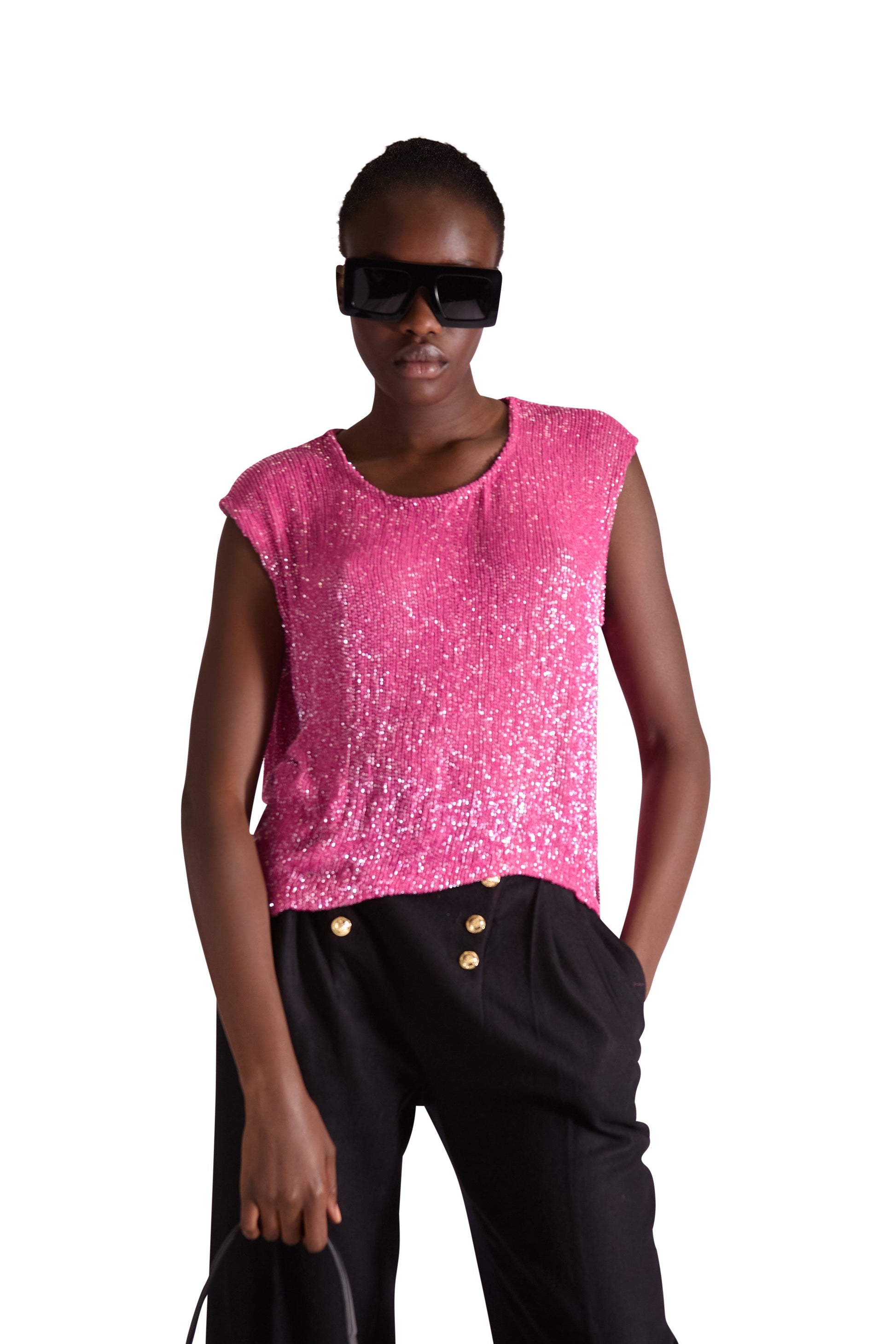 Back view of a premium silk top with zip closure, highlighting its elegant silhouette and silk lining for a luxurious finish.