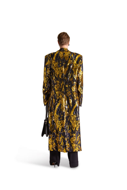 Impeccable detailing of the Helen Anthony long coat with five functional cuff buttons and a distinguished single back vent.