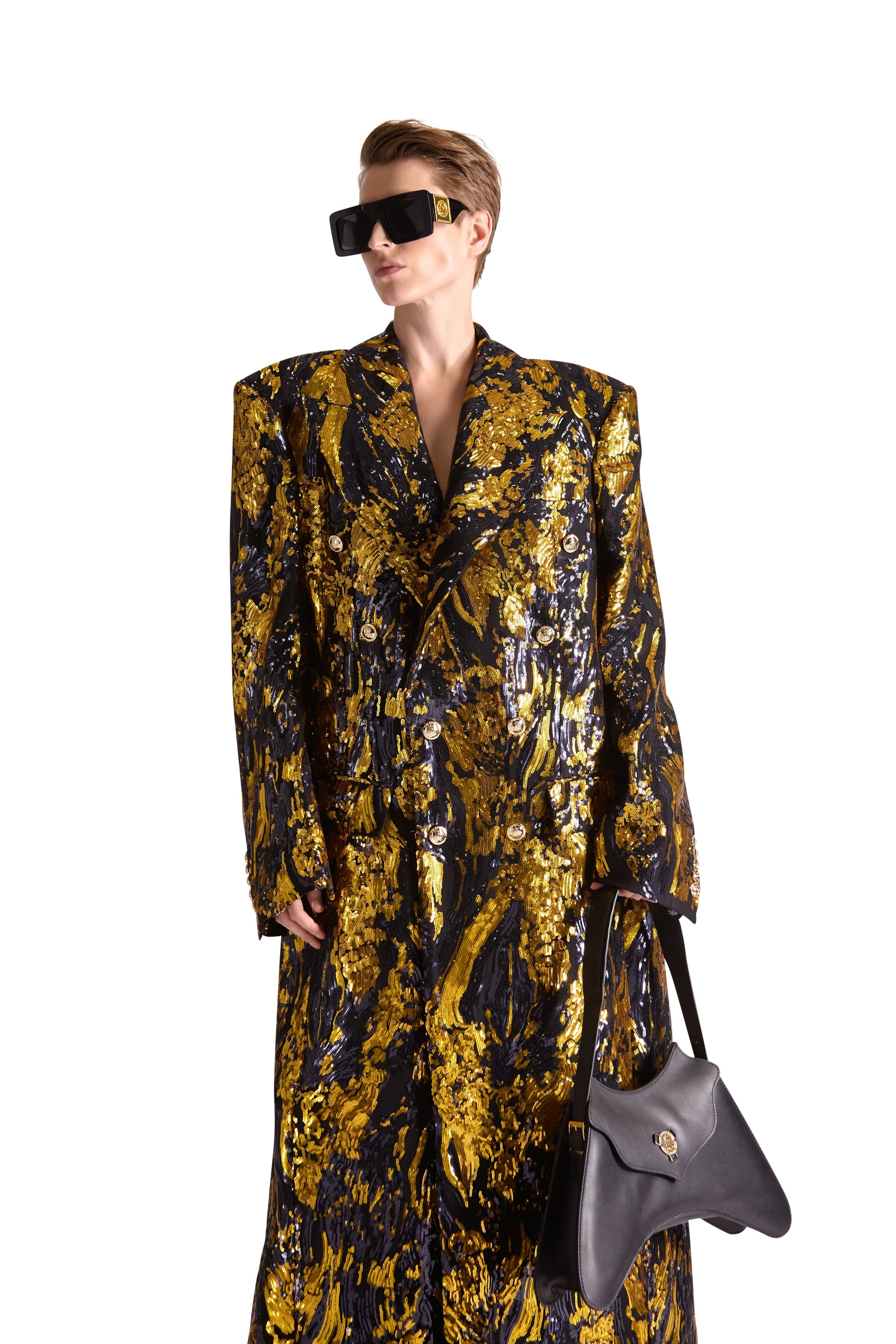 Full view of a sumptuous hand embroidered long coat in British wool, epitomising luxury fashion and artisan craftsmanship, made in Italy.